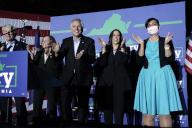 United States Vice President Kamala Harris greets the audience with Terry McAuliffe, the Democratic Party nominee for Governor of Virginia, at his campaign event in Dumfries, Virginia on Thursday, October 21, 2021. Pictured from left to right: Virginia Attorney General Mark Herring, Dorothy McAuliffe, Terry McAuliffe, VP Harris, and Lieutenant Governor candidate Hala Ayala. Credit: Yuri Gripas / Pool via