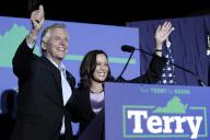 United States Vice President Kamala Harris, right, and Terry McAuliffe, the Democratic Party nominee for Governor of Virginia, left, greet the audience at his campaign event in Dumfries, Virginia on Thursday, October 21, 2021. Credit: Yuri Gripas / Pool via