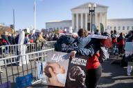 Pro-Life demonstrators pray outside the United States Supreme Court in Washington DC on Wednesday, December 1, 2021. Supreme Court Justices heard oral arguments on Dobbs v. Jackson Women