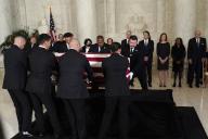 United States Supreme Court Police officers place the flag-draped casket of retired Supreme Court Justice Sandra Day OConnor onto the Lincoln Catafalque before a private service in the Great Hall at the Supreme Court in Washington, Monday, Dec. 18, 2023. Watching from left are Associate Justices of the Supreme Court Clarence Thomas, Samuel Alito, Sonia Sotomayor Elena Kagan, Neil Gorsuch, Brett Kavanaugh, Amy Coney Barrett, Ketanji Brown Jackson and retired Justice Anthony Kennedy.Justice O