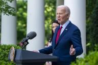 United States President Joe Biden, with American actress Lucy Liu, delivers remarks during a reception celebrating Asian American, Native Hawaiian, and Pacific Islander Heritage Month in the Rose Garden the White House in Washington, DC, USA, 13 May 2024. Credit: Shawn Thew / Pool via