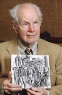 FILE PHOTO Rockport, MA USA January 27, 1997 (MR) Artist Sven Carlson holds a copy of a sketch he drew while a soldier during the Second World War. He published one hundred sketches in a book called, 