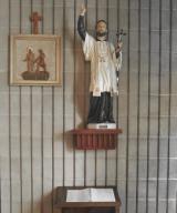Holliston, MA USA: June 23, 2015 A book of intentions lays below a statue of Saint Francis Xavier. This chapel is located at Our Lady of Fatima Shrine. The shrine is operated by the Xaverian Missionaries USA. Chris Fitzgerald / Candidate Photos