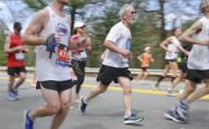 Wellesley, Massachusetts USA: April 17, 2017 Runners compete in the Boston Marathon, about one mile before the half way mark. Chris Fitzgerald/CandidatePhotos/Newscom