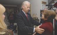 New Ipswich, New Hampshire USA 12-17-2007 FILE PHOTO: Presidential candidate and senator Joe Biden greets a woman during a meet-the-candidate house party at the home of Lisa Brown. On a future date he withdrew his candidacy. Chris Fitzgerald / Candidate