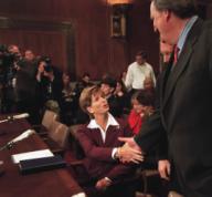 1/17/01 WHITMAN--New Jersey Gov. Christine Todd Whitman nominee for administrator of the Environmental Protection Agency is greeted by Robert C. Smith R-N.H. before her confirmation hearing before Environment & Public Works. CONGRESSIONAL ...