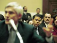 3/17/99 FCC REAUTHORIZATION--FCC Chairman William Kennard background watches Peter Huber a partner of Kellogg Hansen Todd and Evans testify before the House Commerce Telecommunications Subcommitee on FCC reauthorization. CONGRESSIONAL ...