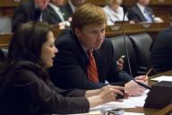 WASHINGTON DC - May 01: Rep. Michele Bachmann R-Minn and Rep. Adam H. Putnam R-Fla. consult during the House Financial Services markup to approve a major expansion of the Federal Housing AdministrationÕs loan-guarantee programs setting the ...