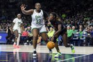 December 01, 2022: Maryland guard Diamond Miller (1) drives through the lane as Notre Dame center Lauren Ebo (33) defends during NCAA Women\'s Basketball game action between the Maryland Terrapins and the Notre Dame Fighting Irish at Purcell Pavilion at the Joyce Center in South Bend, Indiana. Maryland defeated Notre Dame 74-72. John Mersits\/CSM