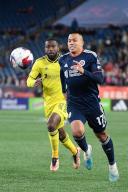 March 18, 2023: New England Revolution forward Bobby Wood (17) chases the ball during the first half against the Nashville SC in Foxborough Massachusetts. Eric Canha