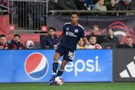 March 18, 2023: New England Revolution midfielder Brandon Bye (15) controls the ball during the first half against the Nashville SC in Foxborough Massachusetts. Eric Canha