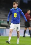 March 28, 2023, London: London, England, 28th March 2023. Tommy Doyle of England warms up during the UEFA Under21 International match at Craven Cottage, London