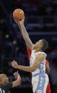 March 16, 2024: Carolina Tarheels Forward (5) Armando Bacot goes up against NC State Wolfpack Forward (23) Mohamed Diarra for the initial tip off during the championship game of the ACC Men