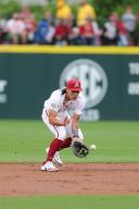 April 26, 2024: Arkansas infielder Wehiwa Aloy #9 comes up on a bouncing ball hit towards him. Arkansas defeated Florida 2-1 in Fayetteville, AR. Richey Miller\/CSM(Credit Image: Richey Miller\/Cal Sport Media