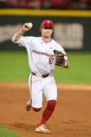 April 26, 2024: Arkansas infielder Peyton Stovall #10 chases down a base runner who was caught in between bases. Arkansas defeated Florida 2-1 in Fayetteville, AR. Richey Miller\/CSM(Credit Image: Richey Miller\/Cal Sport Media