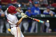 April 26, 2024: Wehiwa Aloy #9 of Arkansas makes contact with the ball while at the plate. Arkansas defeated Florida 2-1 in Fayetteville, AR. Richey Miller\/CSM(Credit Image: Richey Miller\/Cal Sport Media