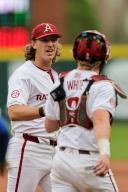 April 26, 2024: Hagen Smith #33 Arkansas pitcher has a conversation with his catcher Hudson White #8 as they come off the field following an inning. Arkansas defeated Florida 2-1 in Fayetteville, AR. Richey Miller\/CSM(Credit Image: Richey Miller\/Cal Sport Media