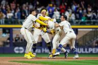 April 26, 2024: Milwaukee Brewers third base Joey Ortiz (3) is mobbed by teammates outfielder Sal Frelick (10), catcher William Contreras (24), and shortstop Willy Adames (27) after his walk-off hit RBI after the game between the Milwaukee Brewers and the New York Yankees at American Family Field in Milwaukee, WI. Darren Lee\/CSM (Credit Image: Darren Lee\/Cal Sport Media