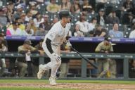 April 25 2024: Colorado center fielder Brenton Doyle (9) gets a hit during the San Diego and Colorado Rockies game held at Coors Field in Denver Co. David Seelig\/Cal Sport Medi(Credit Image: ÃÂ David Seelig \/ Cal Sport Media\/Cal Sport Media) (Credit Image: Â David Seelig \/ Cal Sport Media\/Cal Sport Media