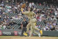 April 25 2024: Colorado first baseman Jake Cronenworth (9) makes a play during the San Diego and Colorado Rockies game held at Coors Field in Denver Co. David Seelig\/Cal Sport Medi(Credit Image: ÃÂ David Seelig \/ Cal Sport Media\/Cal Sport Media) (Credit Image: Â David Seelig \/ Cal Sport Media\/Cal Sport Media