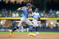 April 29, 2024: Tampa Bay Rays shortstop JosÅ½ Caballero (7) fields a ball and throws the runner out at first during the game between the Milwaukee Brewers and the Tampa Bay Rays at American Family Field in Milwaukee, WI. Darren Lee\/CSM (Credit Image: Darren Lee\/Cal Sport Media