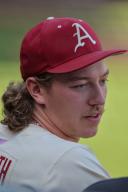 May 1, 2024: Razorback pitcher Hagen Smith #33 has a conversation with a team mate along the dugout fence between innings. Arkansas defeated Missouri State 8-5 in Fayetteville, AR. Richey Miller\/CSM(Credit Image: Richey Miller\/Cal Sport Media