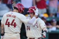 May 1, 2024: Parker Rowland #44 of Arkansas greets team mate Peyton Holt #24 at home follow a home run by Holt. .Arkansas defeated Missouri State 8-5 in Fayetteville, AR. Richey Miller\/CSM(Credit Image: Richey Miller\/Cal Sport Media