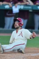May 1, 2024: Parker Rowland #44 of Arkansas slides safely into home plate. Arkansas defeated Missouri State 8-5 in Fayetteville, AR. Richey Miller\/CSM(Credit Image: Richey Miller\/Cal Sport Media
