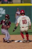 May 1, 2024: Bears infielder Tyler Epstein #4 looks in a ball thrown down to him as Peyton Stovall #10 of Arkansas goes into the bag. Arkansas defeated Missouri State 8-5 in Fayetteville, AR. Richey Miller\/CSM(Credit Image: Richey Miller\/Cal Sport Media