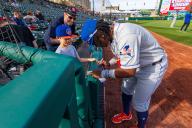 May 3rd, 2024: Syracuse Mets infielder Luisangel Acuna (2) signs an autograph in a game against the Rochester Red Wings. The Rochester Red Wings hosted the Syracuse Mets in an International League game at Innovative Field in Rochester, New York. (Jonathan Tenca\/CSM) (Credit Image: Â Jonathan Tenca\/Cal Sport Media