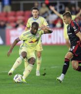 May 15, 2024: New York Red Bulls Forward (11) Elias Manoel controls the ball in front of D.C. United Defender (3) Lucas Bartlett during an MLS soccer match between the D.C. United and the New York Red Bulls at Audi Field in Washington DC. Justin Cooper\/CSM (Credit Image: Â Justin Cooper\/Cal Sport Media