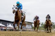 May 18, 2024, Baltimore, Md, USA: Gun Song (5), ridden by John Velazquez, wins the Black-Eyed Stakes on Black-Eyed Susan Stakes Day at Pimlico Race Course in Baltimore, Maryland on May 17, 2024. Alex Evers/Eclipse Sportswire/CSM(Credit Image: Alex Evers/Cal Sport Media