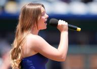 MAY 19, 2024: KU student Ella Bentley sing the National anthem at Kauffman Stadium Kansas City, Missouri. Jon Robichaud/CSM. (Credit Image: Â Jon Robichaud/Cal Sport Media