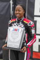 June 01, 2024: 20 year-old Royal Enfield rider #1 Mikayla Moore accepts the 2023 American Motorcyclist Association Female Racer of the Year award during the MotoAmerica Royal Enfield Build. Train. Race. event at Road America in Elkhart Lake, WI - Mike Wulf/CSM (Credit Image: Mike Wulf/Cal Sport Media