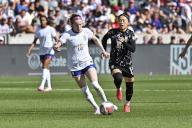June 01, 2024: US midfielder, Rose Lavelle (16), moves the ball downfield as Korean midfielder, JEON Eun-ha (14), pursues her, during the International Women