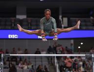 June 2, 2024: Trinity Thomas practices her bar routine during the Woman