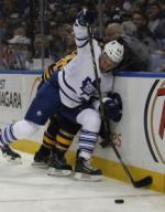 Toronto Maple Leafs defenseman Morgan Rielly (44) took Buffalo Sabres right wing Patrick Kaleta (36) off the puck with a check during the second period of play in the NHL Hockey game between the Buffalo Sabres and Toronto Maple Leafs at the First ...