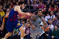 David Lighty of ASVEL, blocked by Pierre Oriola of Barcelona, during the Euroleague Basketball match between Barcelona and ASVEL at the Camp Nou Stadium, Barcelona, Spain, on December 17th, 2019. FLORENCIA TAN JUN/
