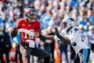October 23, 2022: Tampa Bay Buccaneers quarterback Tom Brady (12) gets sacked by Carolina Panthers defensive end Brian Burns (53) during the first quarter of the NFL matchup in Charlotte, NC. (Scott Kinser/Cal Sport Media
