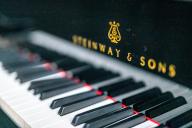 Black and white keys of a Steinway & Sons piano in sharp focus