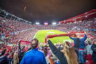 Fans anticipating kickoff at Sevilla FCs home ground during a Champions League match