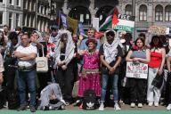 People take part during march protest to commemorate the 76th anniversary of the Nakba and against the ongoing conflict Israel and the Palestinian at the Dam Square on May 11, 2024 in Amsterdam,Netherlands. Nakba Day marks the anniversary of the some 700,000 Palestinians fled or were expelled on Israel