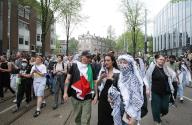 Students and supporters pro-Palestinian block the street in front of the University of Amsterdam to protest against the ongoing conflict Israel and the Palestinian on May 13,2024 in Amsterdam,Netherlands