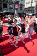 People trying ballet in Puerta del Sol during Madrid en Danza 2024 festival, Madrid