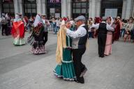 Mature dancers dance the traditional chotis during the San Isidro festivities in Madrid