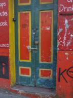 A colorful painted door on a building in Castro on Chiloe Island in Chile