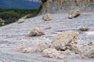 Stony soil with conglomerates on the shore of a swamp. Yesa reservoir. Aragon, Spain
