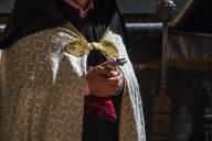 Armenian priest holding a crucifix at the Church of the Holy Mother of God in Geghard Monastery, Azat Valley; Kotayk,