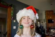 com.newscom.model.mediaobject.impl.MSMediaObject@57ebc08a[tagId=depphotos263441,docId=34549914HighRes,ftSubject=Girl plays with Christmas tree ornaments,rfrm=<null>]