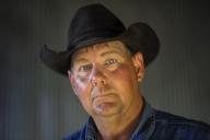 com.newscom.model.mediaobject.impl.MSMediaObject@308e45e3[tagId=depphotos265462,docId=34553380HighRes,ftSubject=Portrait of a rancher wearing a cowboy hat,rfrm=<null>]